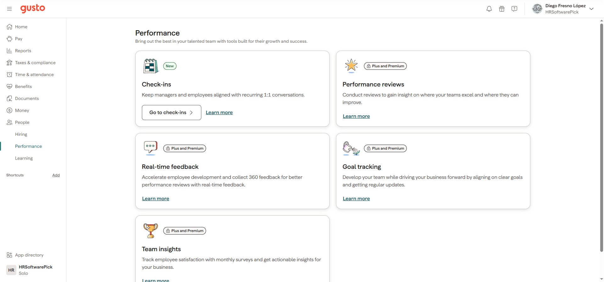 Gusto Performance section showing five tools: Check-ins free on all plans, plus Performance reviews, Real-time feedback, Goal tracking, and Team insights for Plus and Premium